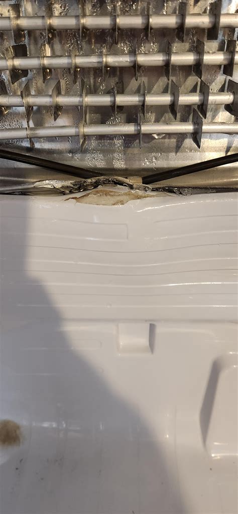 what is metal box on top of samsung fridge|samsung fridge metal tab screwed.